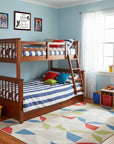 Children's bedroom with a wooden bunk bed, colorful rug, and toys with a Boston Terrier-Heritage History Dog Breed Portrait on the wall