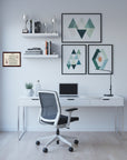 Modern home office with a desk, chair, and Bull Terrier-Heritage History Dog Breed Portrait on the wall.
