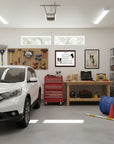 Border Collie-Heritage History Dog Breed Portrait in a Garage interior with a white car, tool chest, workbench, and storage shelves.