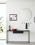 Modern interior with a black console table, mirror, and decorative items against a white wall with a Dalmatian-Heritage History Dog Breed Portrait on the wall besides the mirror.
